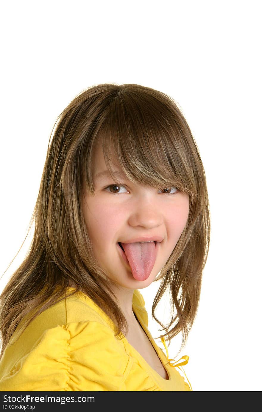 Beautiful girl puts out tongue