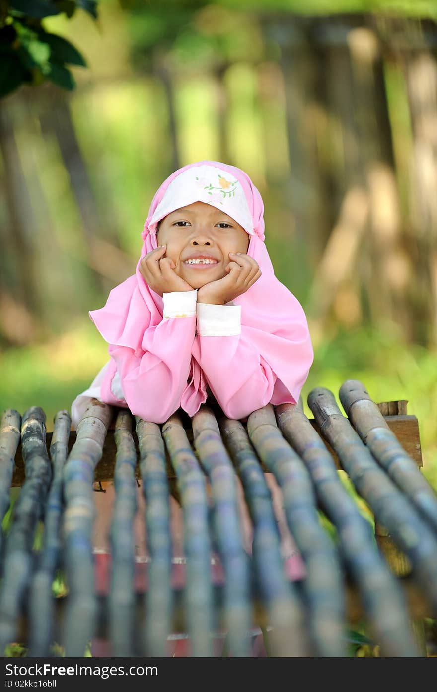 Outdoor portrait  of Indonesian happy Muslim girl