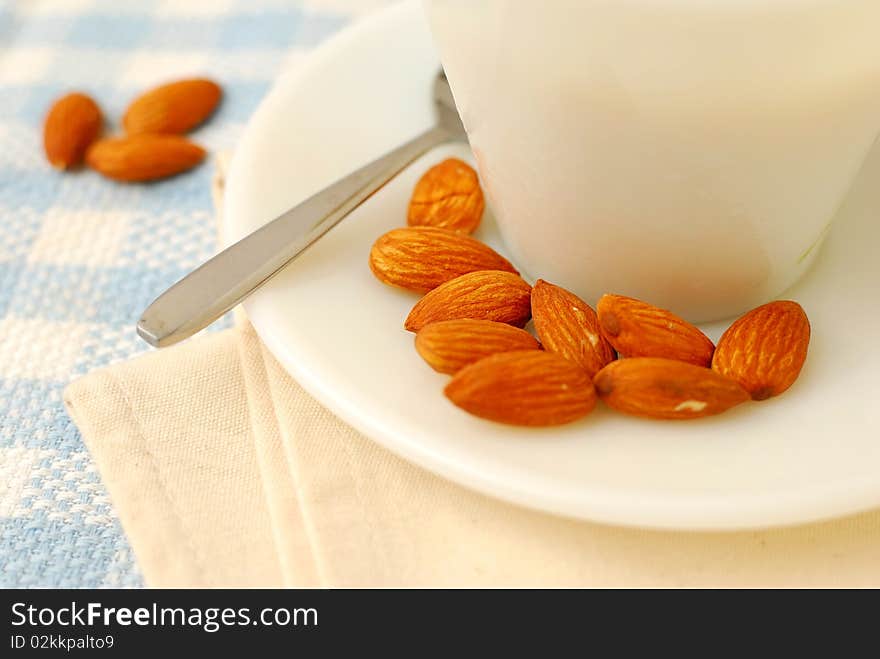 Top view of nutritious almond drink with almond seeds. Almond is used in Chinese desserts and cuisine. For food and beverage, and diet and nutrition concepts. Top view of nutritious almond drink with almond seeds. Almond is used in Chinese desserts and cuisine. For food and beverage, and diet and nutrition concepts.