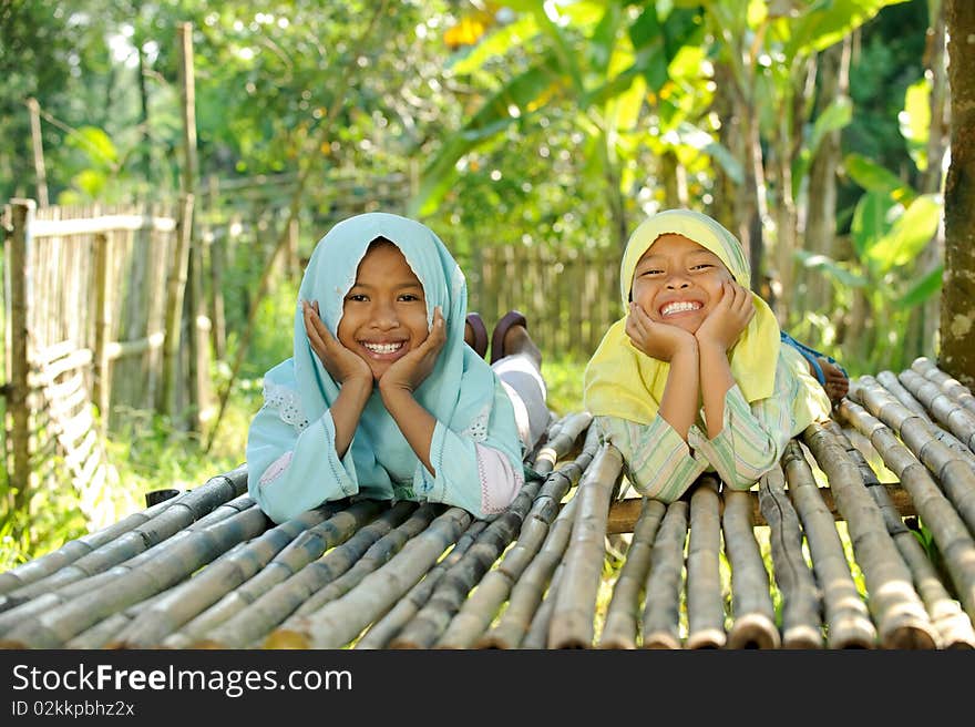 Outdoor portrait of happy Muslim kids. Outdoor portrait of happy Muslim kids