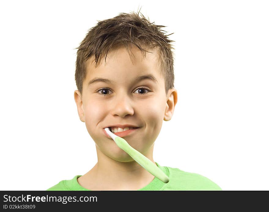 Boy with toothbrush in his mouth - isolated