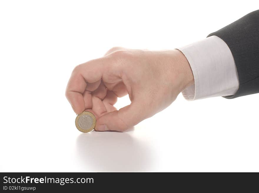 Businessman's hand with euro coin isolated on white background