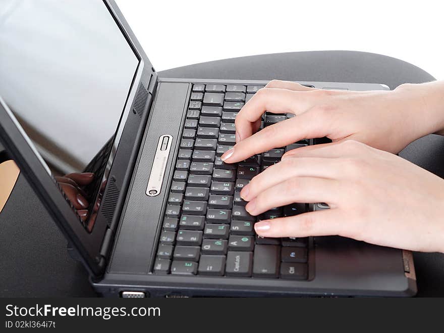 Female hands working on laptop