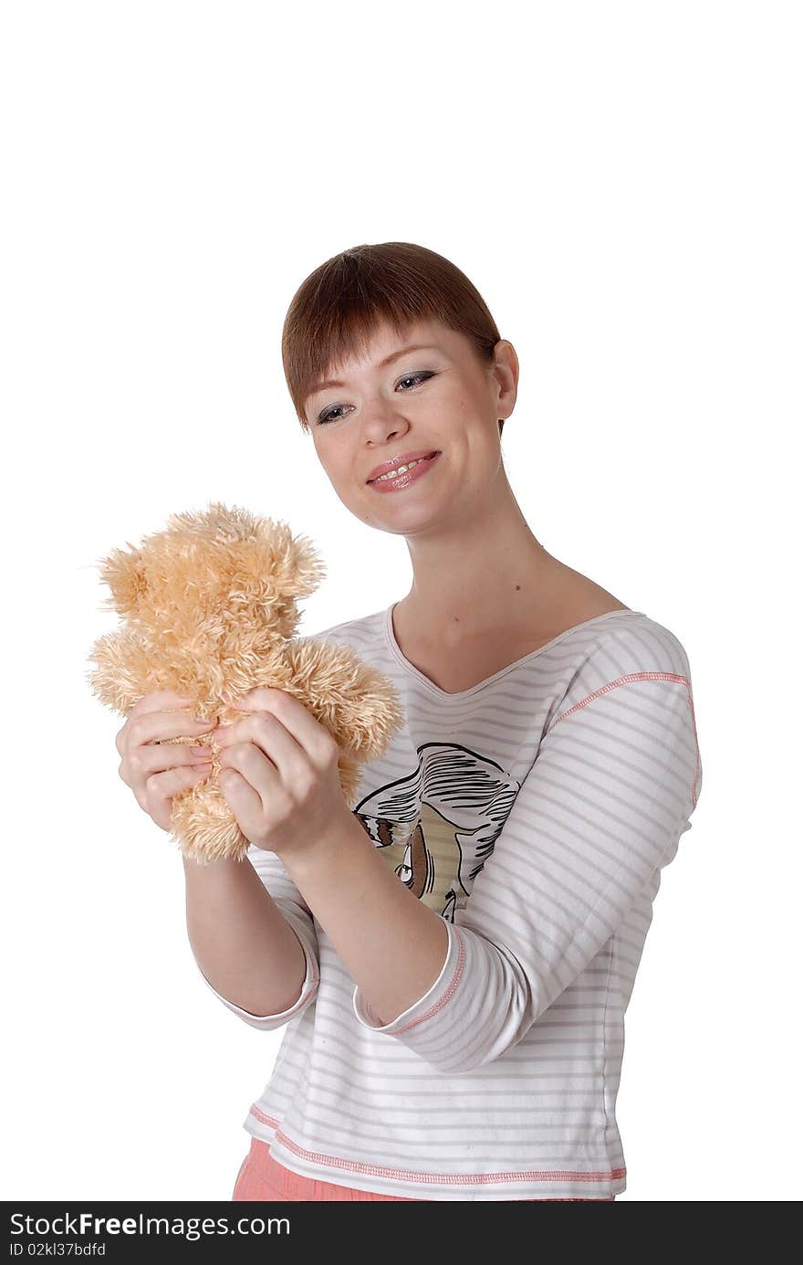 Charming young woman with Teddy in the hands