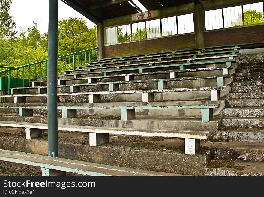 Seats in old football stadium