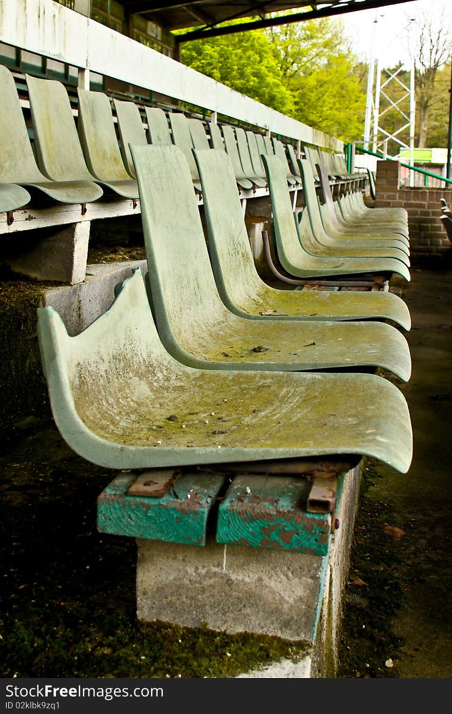 Seats in old football stadium