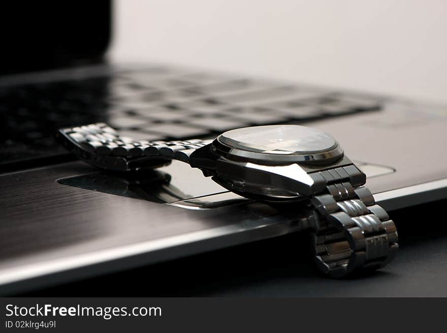 Chronograph on a keyboard of notebook. Chronograph on a keyboard of notebook