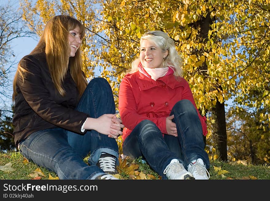 Two Girls In Autumn Park