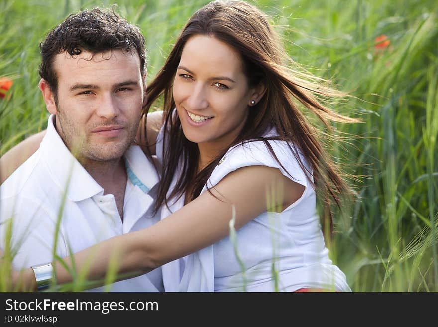 Closeup on young beautiful smiling couple. Closeup on young beautiful smiling couple.