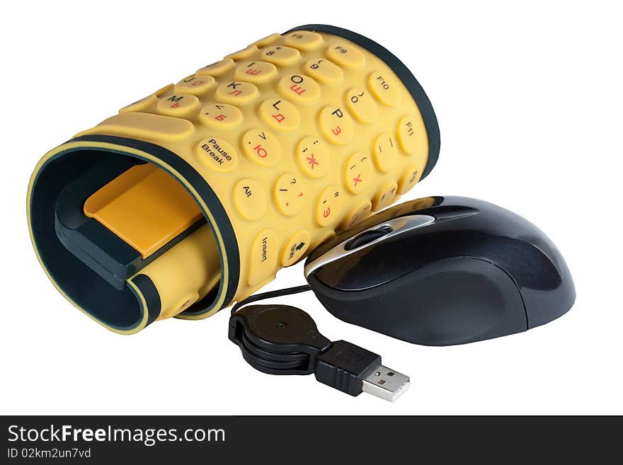 The keyboard the rubber flexible yellow it is isolated on a white background