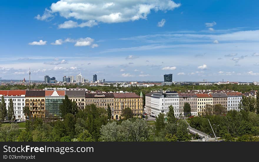 Skyline in the back are from famous Donau City (Donaupark) part of the danube valley. In front the green heart of vienna called Prater. Row of houses at the SchÃ¼ttelstrasse, beside the Danube Canal. Skyline in the back are from famous Donau City (Donaupark) part of the danube valley. In front the green heart of vienna called Prater. Row of houses at the SchÃ¼ttelstrasse, beside the Danube Canal.