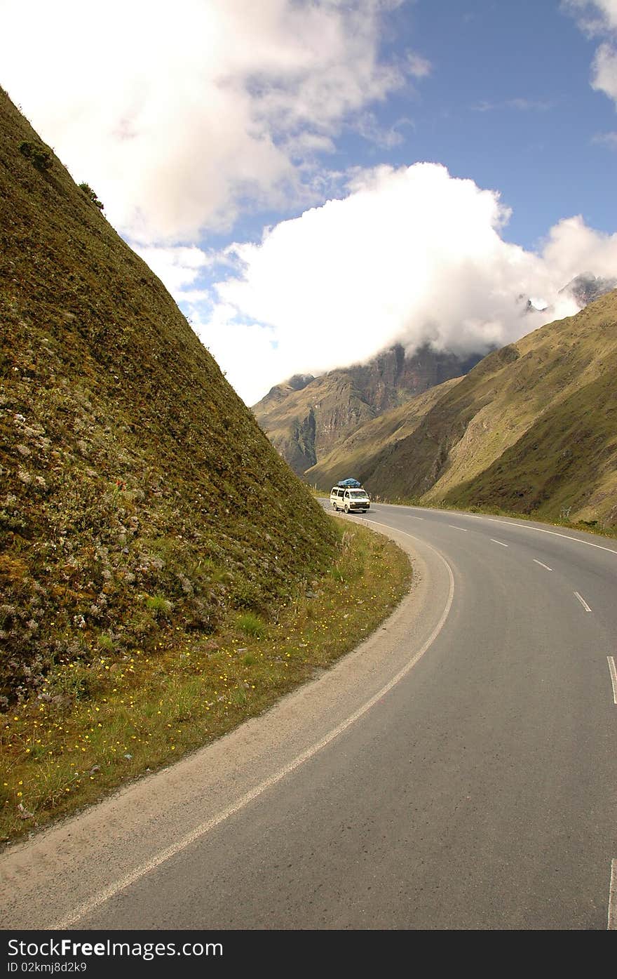 A van on the way to a trip driving in the mountains of Bolivia. A van on the way to a trip driving in the mountains of Bolivia.