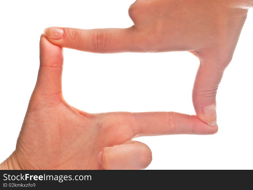 Woman's hands forming a frame. Isolated on a white background.