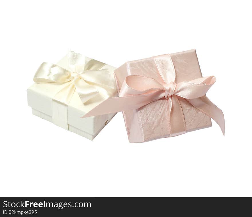 Small boxes with ribbons and bows to wrap gifts. Small boxes with ribbons and bows to wrap gifts