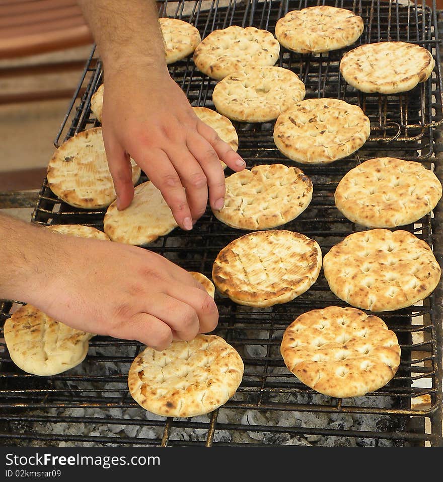 Hot Greek Pita Bread on the grill. Barbecue