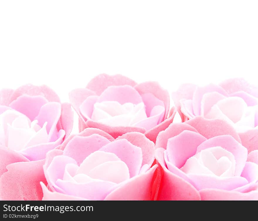 Buds of artificial pink roses close up