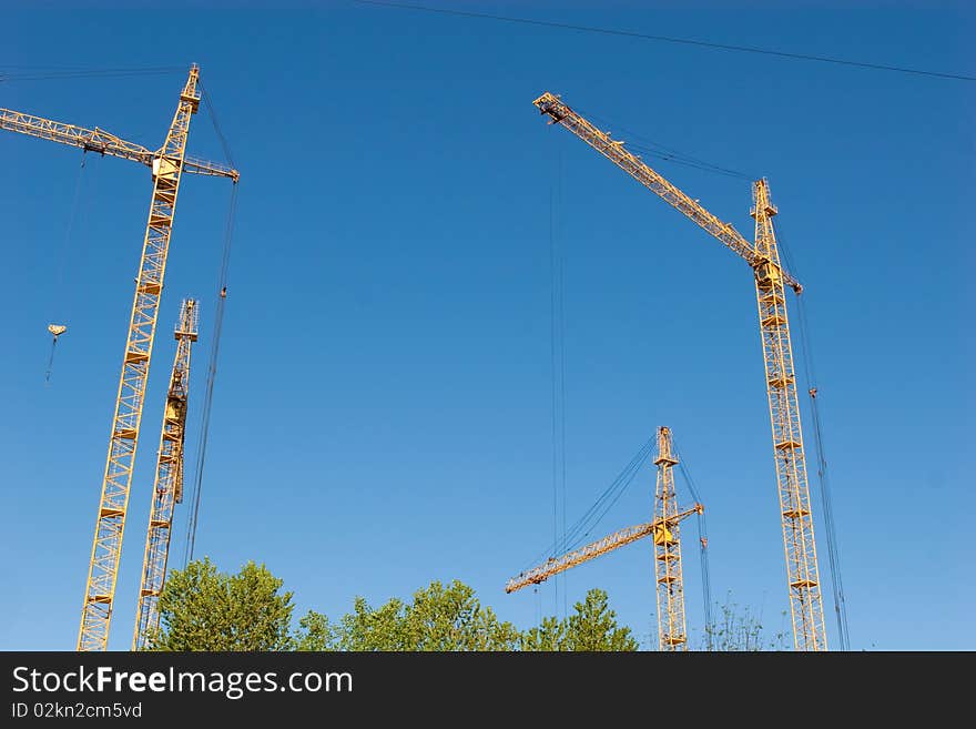 Four Hoisting Cranes