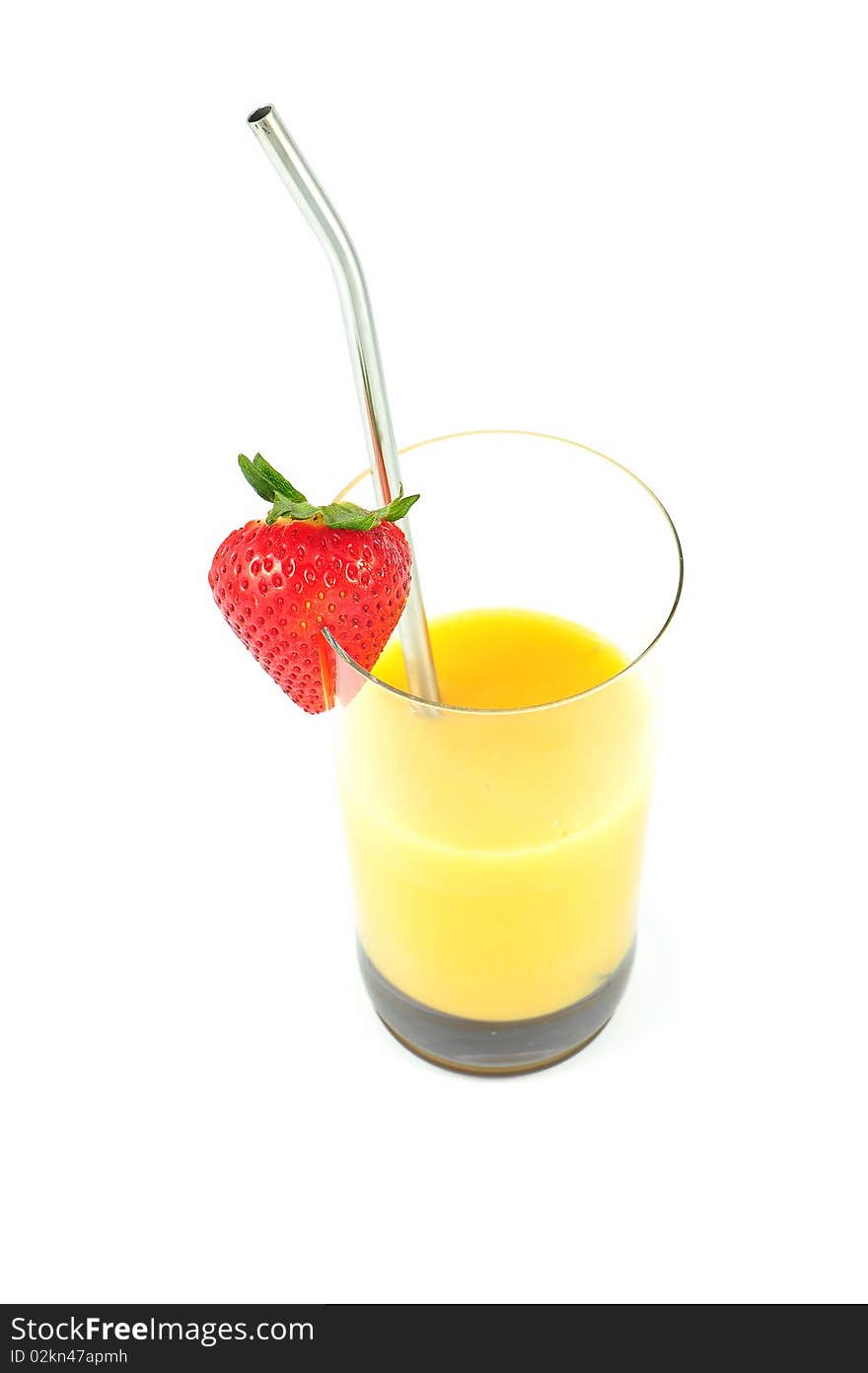 Orange cocktail with strawberry and spoon