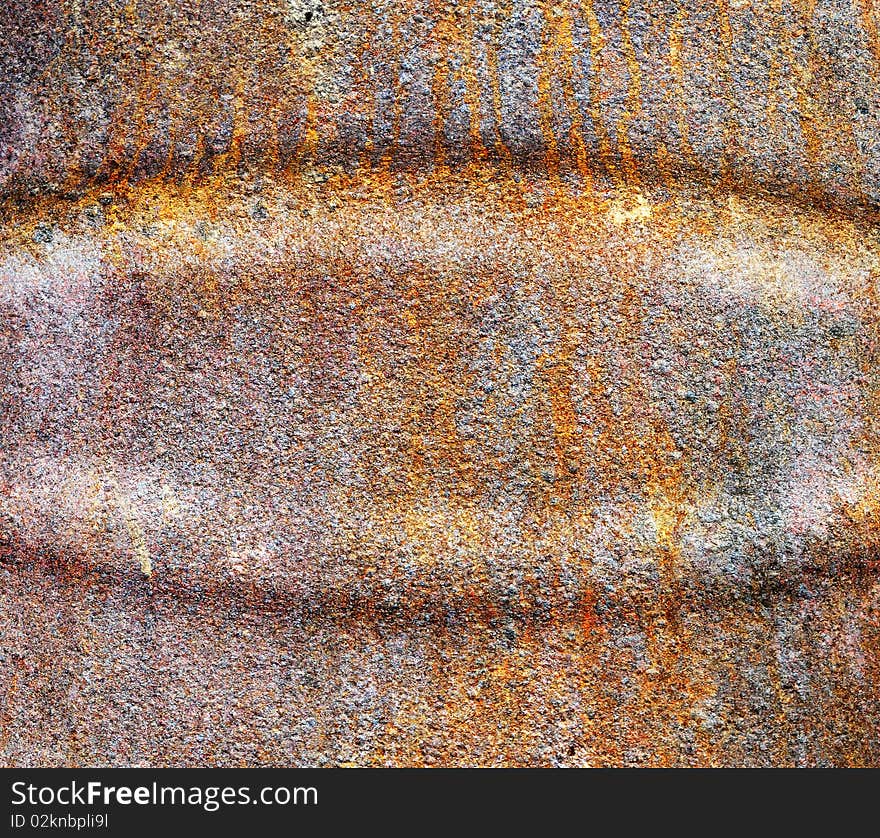 Rust texture background originally from an old burn barrel. gritty brown and orange colors. Rust texture background originally from an old burn barrel. gritty brown and orange colors