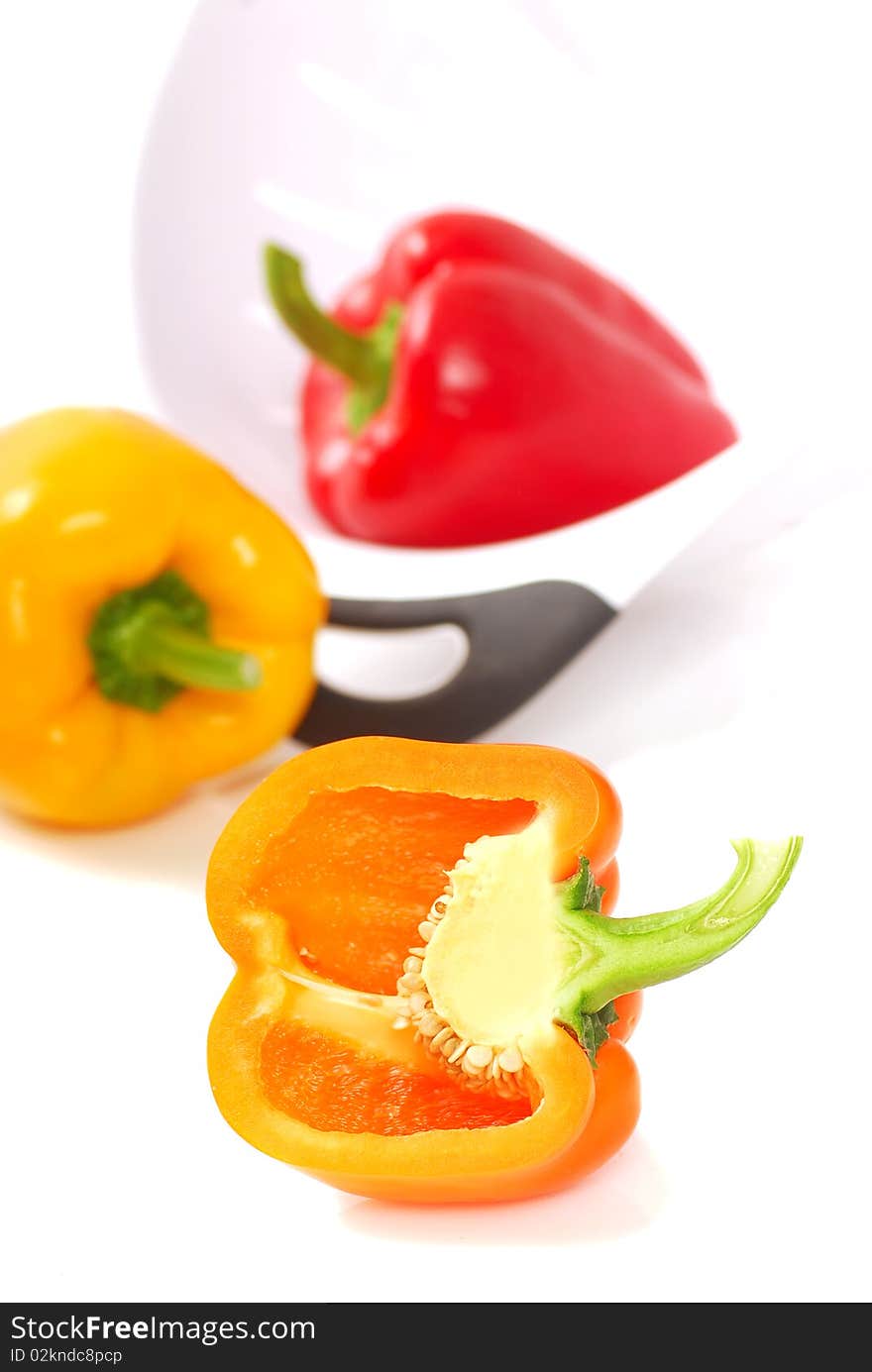 Orange, yellow and red bell peppers