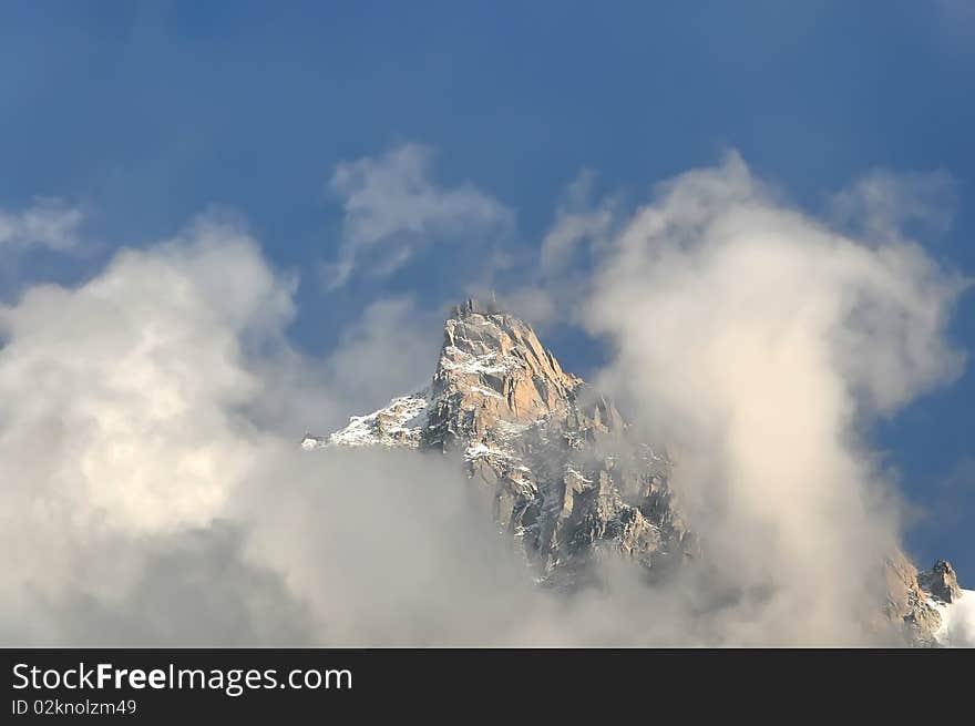 The Aiguille du Midi, a mountain in the Mont Blanc Massif in the French Alps. Famous touristic destination. Mont Blanc, France, Europe