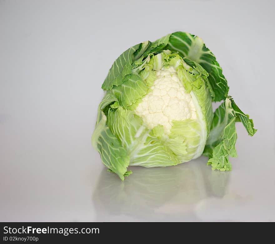 Healthy cauliflower isolated on cool grey