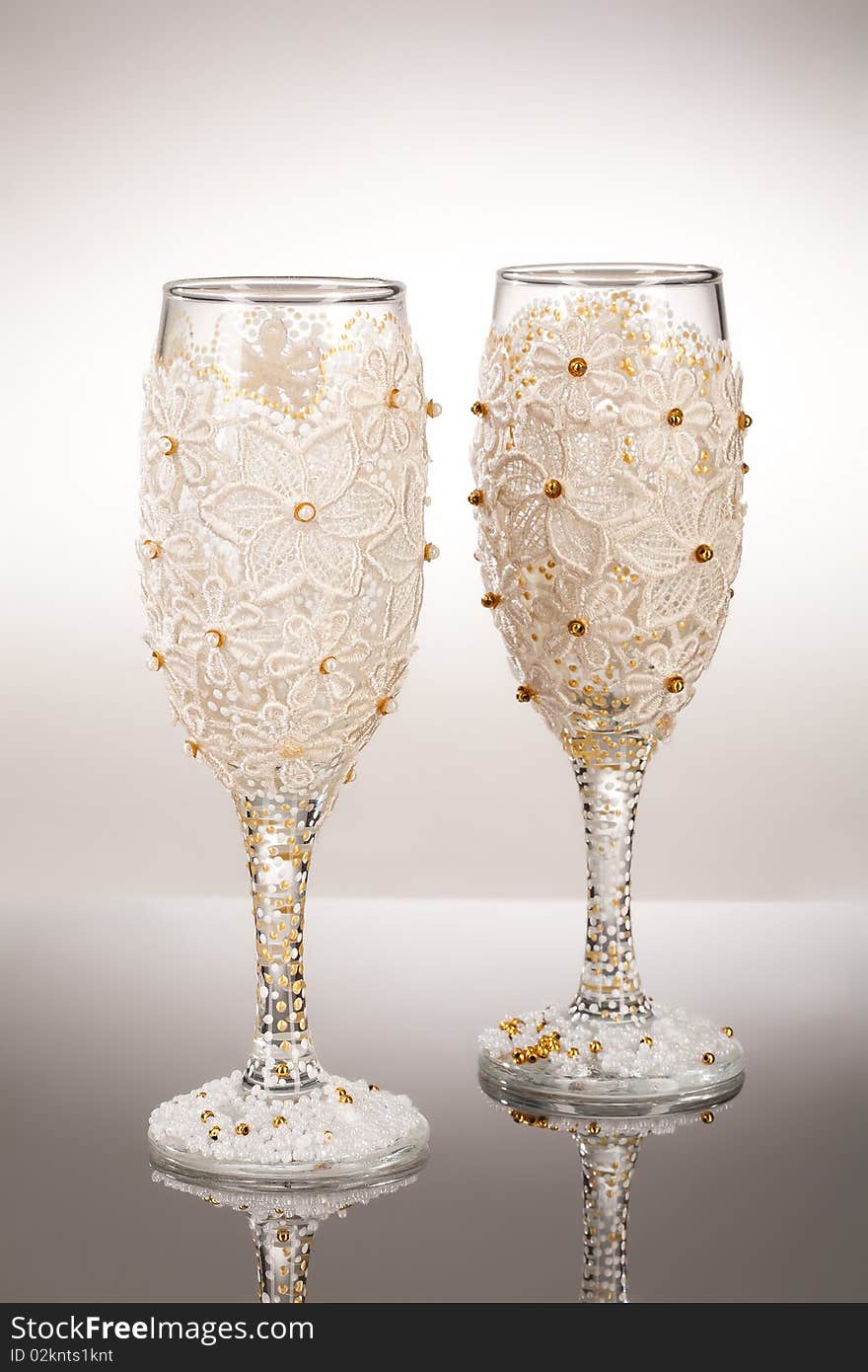 Two decorated glasses on isolated background. Two decorated glasses on isolated background