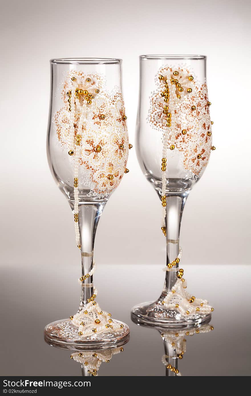 Two decorated glasses on isolated background. Two decorated glasses on isolated background