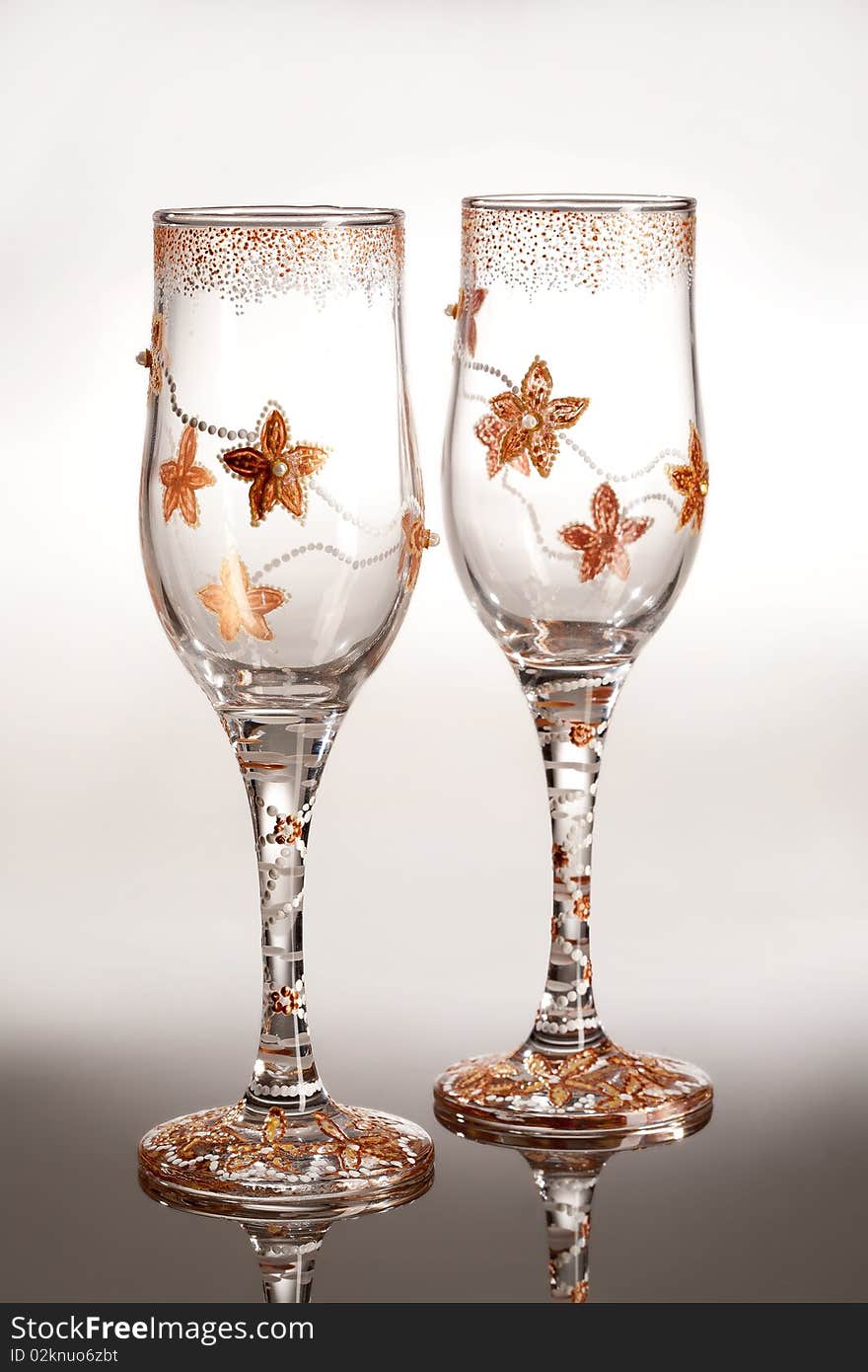 Two decorated glasses on isolated background. Two decorated glasses on isolated background