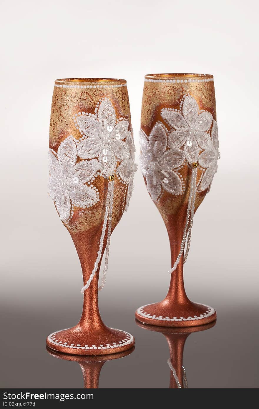 Two decorated glasses on isolated background. Two decorated glasses on isolated background