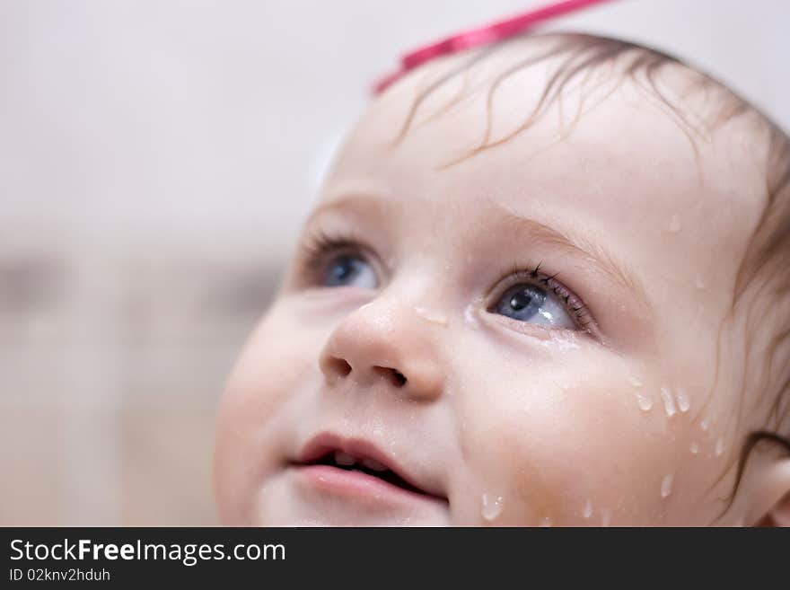 Portrait of baby in bath