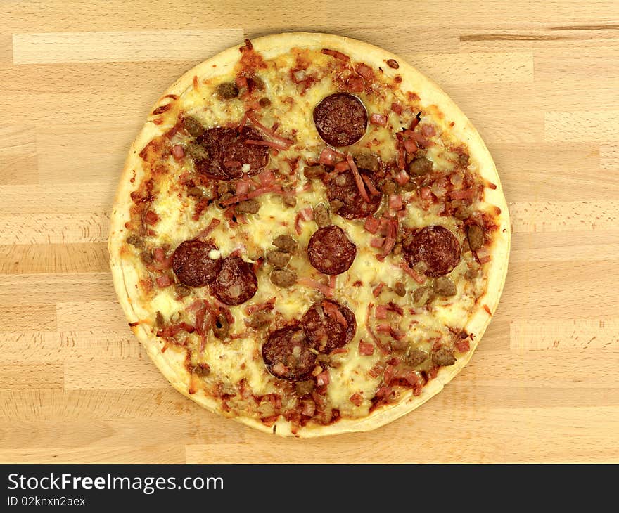 Freshly cooked takeaway pizza on a kitchen bench. Freshly cooked takeaway pizza on a kitchen bench