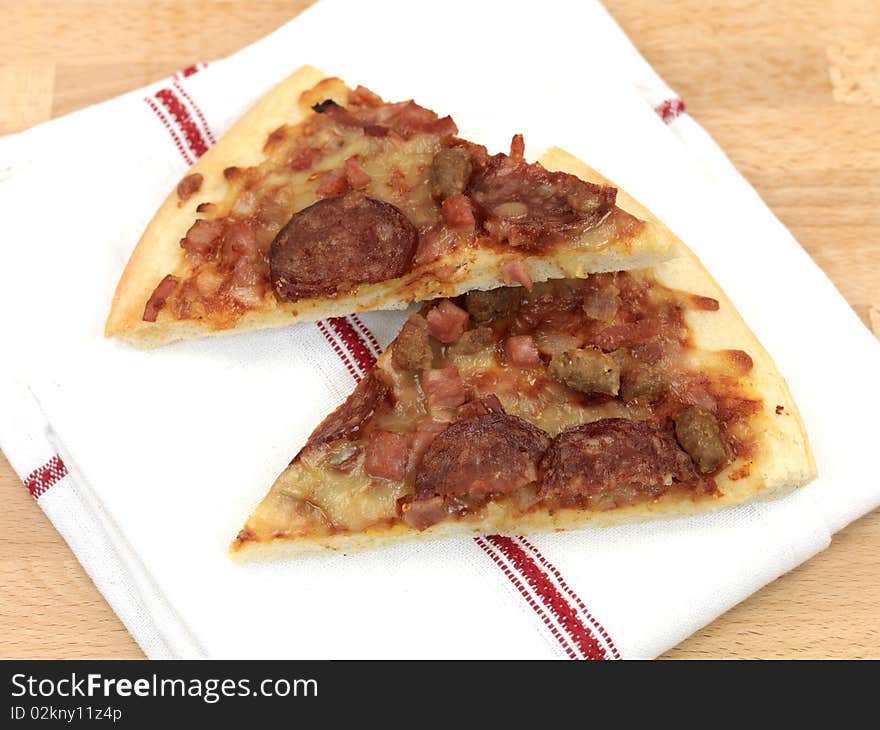 Freshly cooked takeaway pizza on a kitchen bench. Freshly cooked takeaway pizza on a kitchen bench