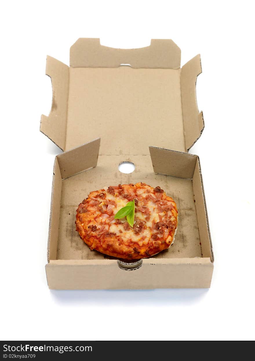 Mini Pizzas isolated on a kitchen bench