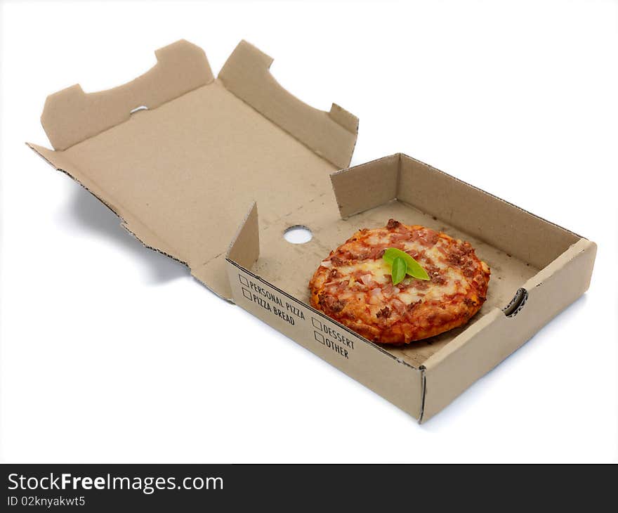 Mini Pizzas isolated on a kitchen bench