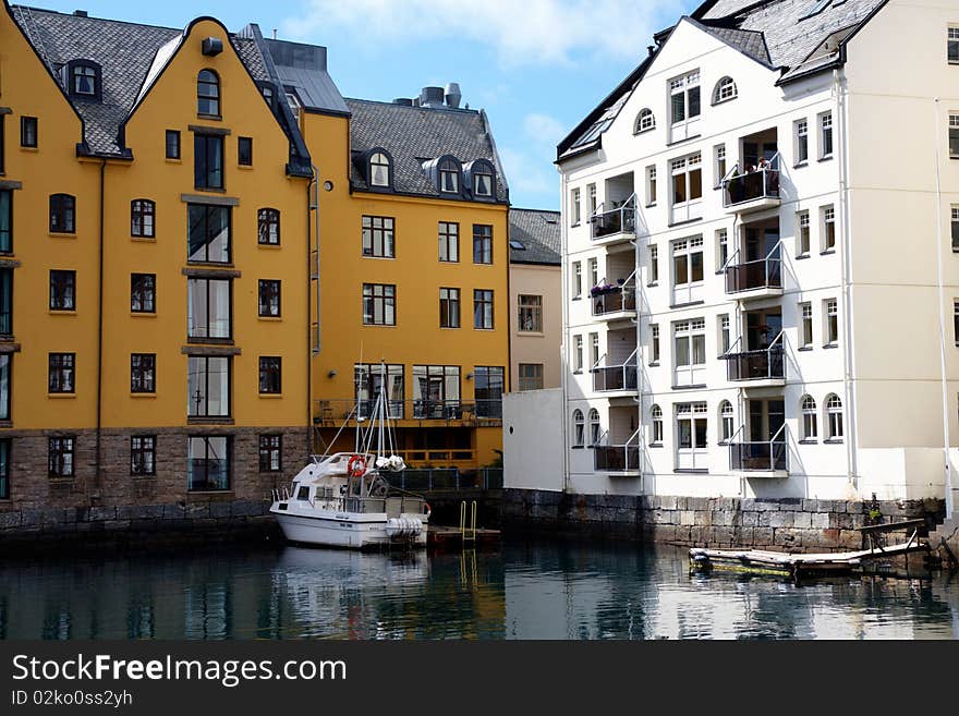 Boat in a river near buildings