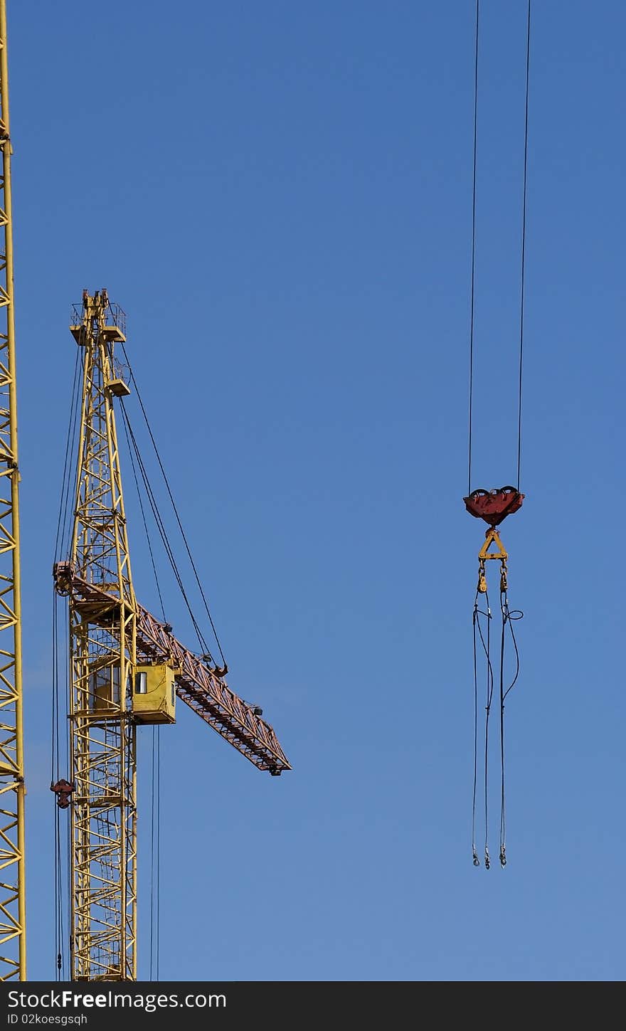 Elevating construction crane