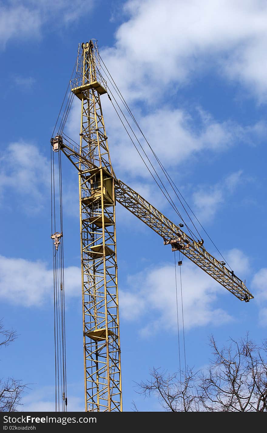 Elevating construction crane