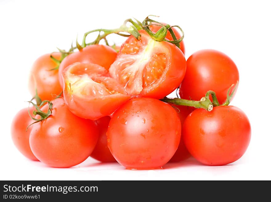 Fresh tomatoes over white