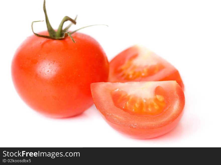 Fresh tomatoes over white