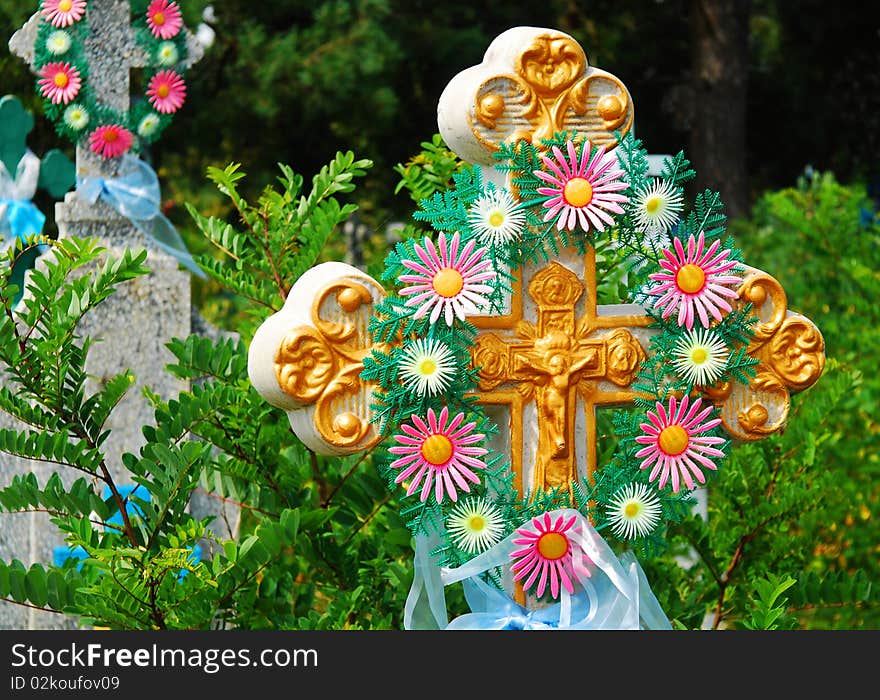 Old cross on churchyard in Ukraine