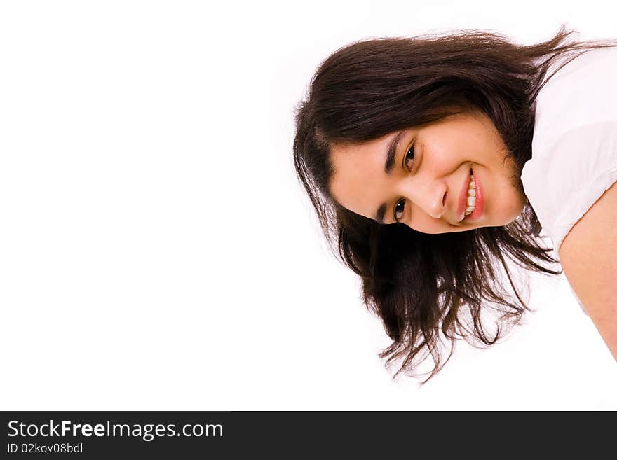 Portrait of a beautiful brunette woman isolated on white