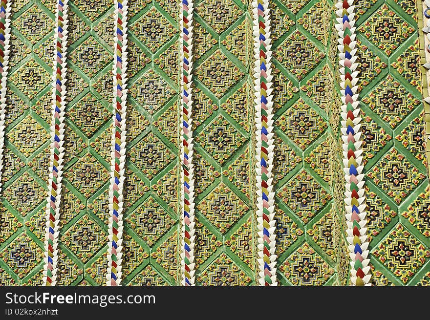 Patterns to decorate with mosaic. The Wat Phra Kaew Is a kind of art. Patterns to decorate with mosaic. The Wat Phra Kaew Is a kind of art.