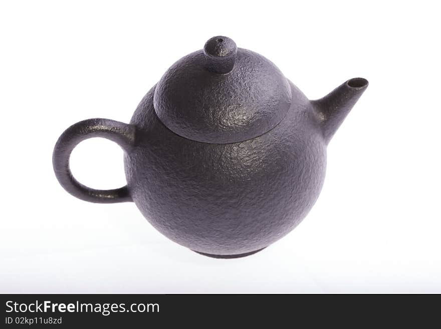 Chinese handmade teapot isolated on white background.