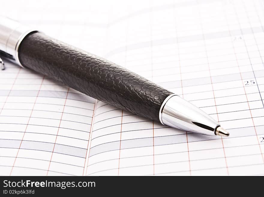 Notebook and a pen - wonderful business background