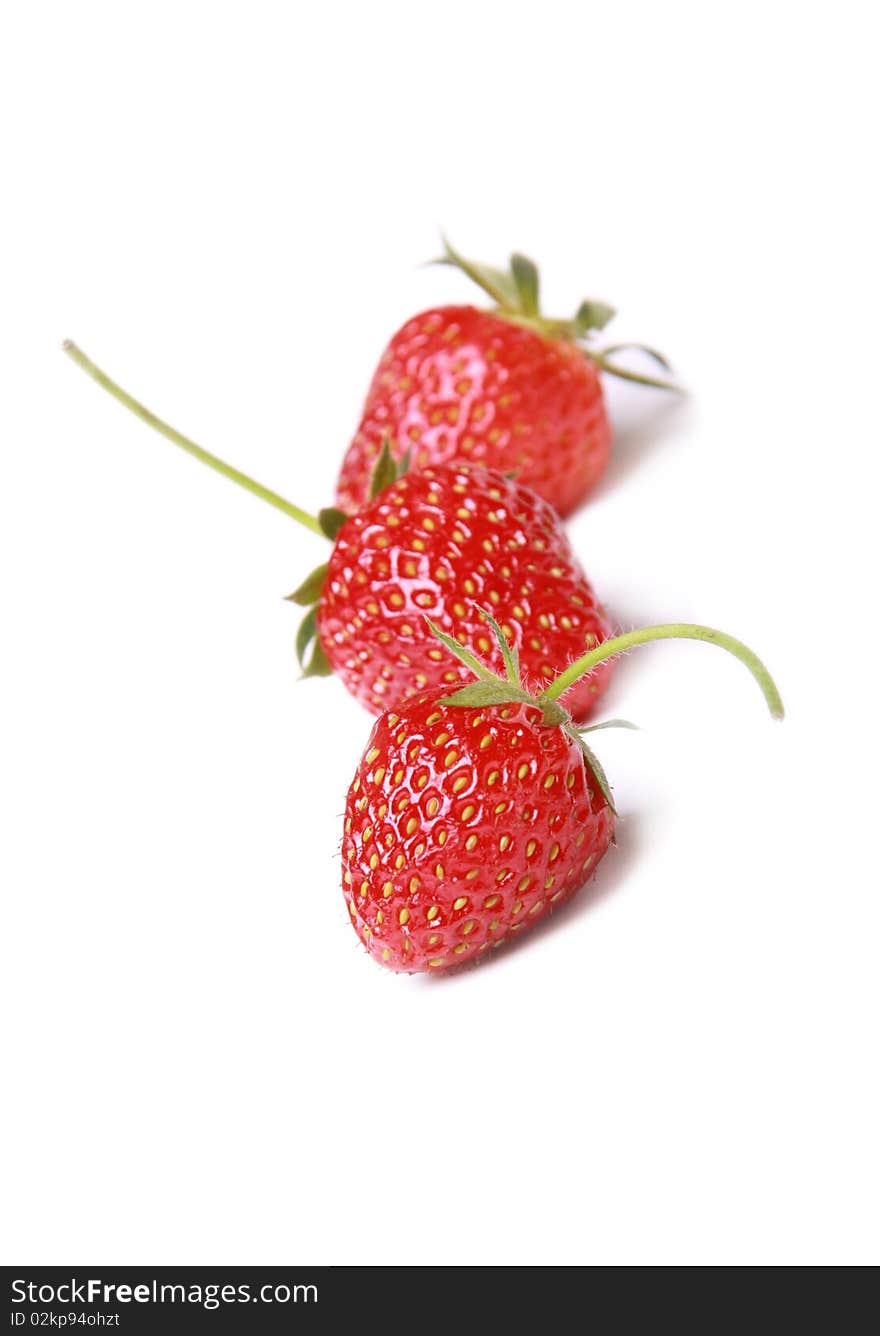 Three strawberry isolated on white background