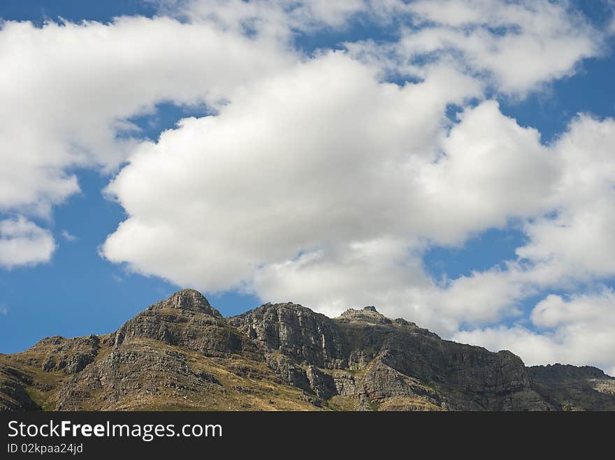 Mountain peak with clouds