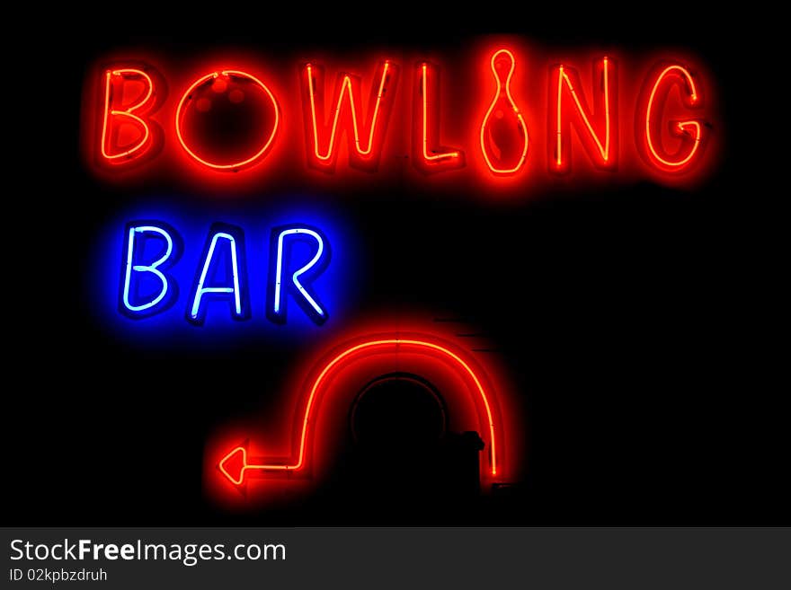 BOWLING BAR neon sign with arrow