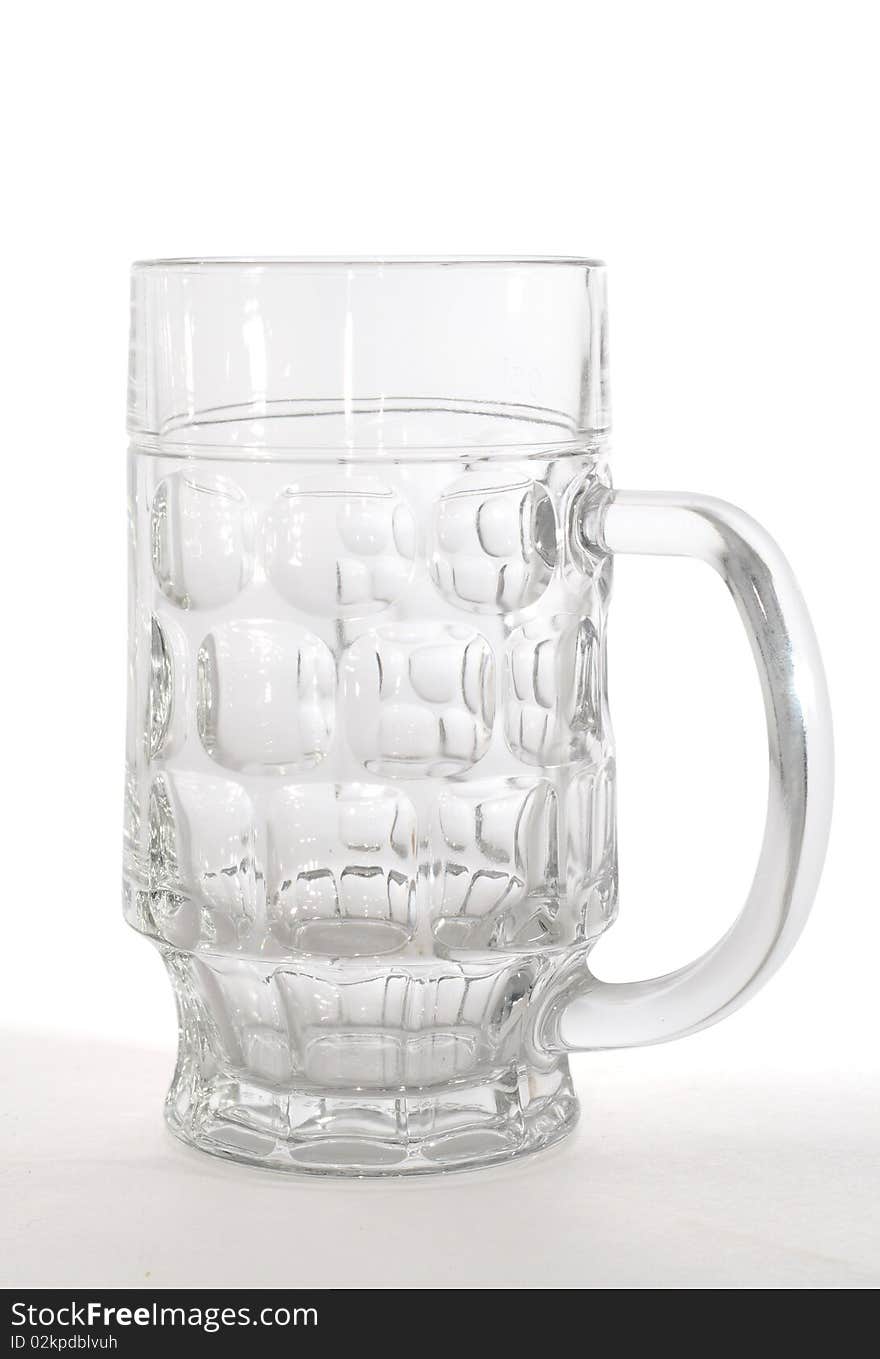 Empty beer mug isolated on white