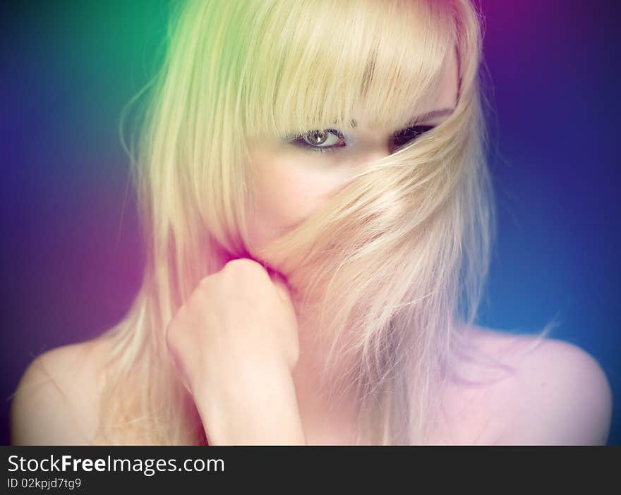 Blond in studio in colors